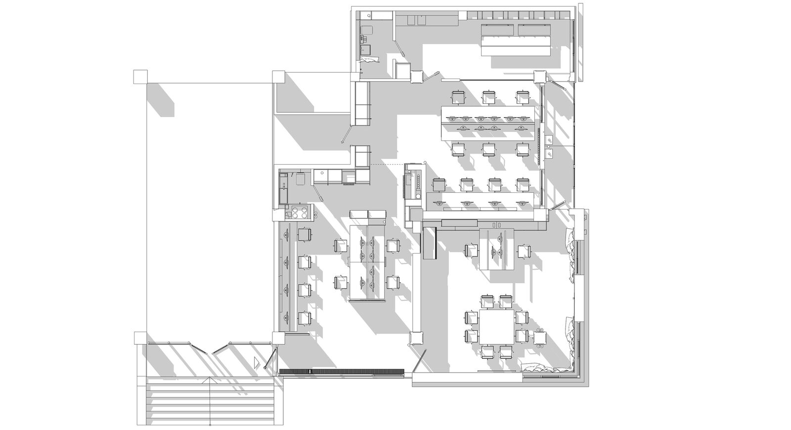 Деталь офиса Archform Studio: стеллажи, деревянная отделка и чёрные рамы стекла